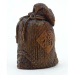 A Oriental model of a Kinchaku / Japanese drawstring bag. Approx. 2 3/4" Please Note - we do not