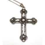A white metal filigree cross on chain. Cross approx. 2?, chain approx. 19? Please Note - we do not