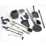A quantity of assorted 19thC and later fire tools etc. to include a cast iron waffle iron, a cast