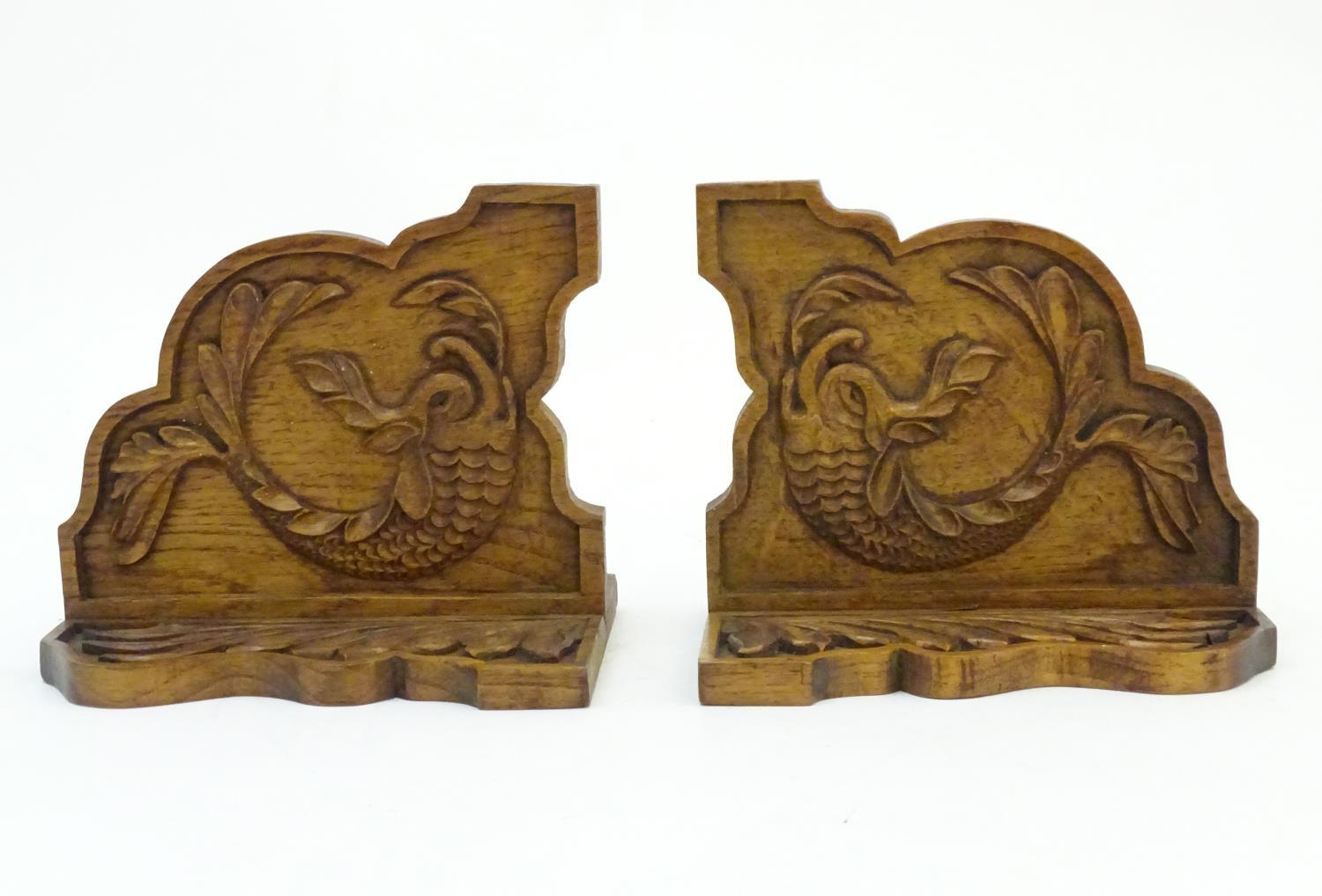 A pair of 20thC bookends with carved fish detail. Approx. 8" long (2) Please Note - we do not make - Image 4 of 7
