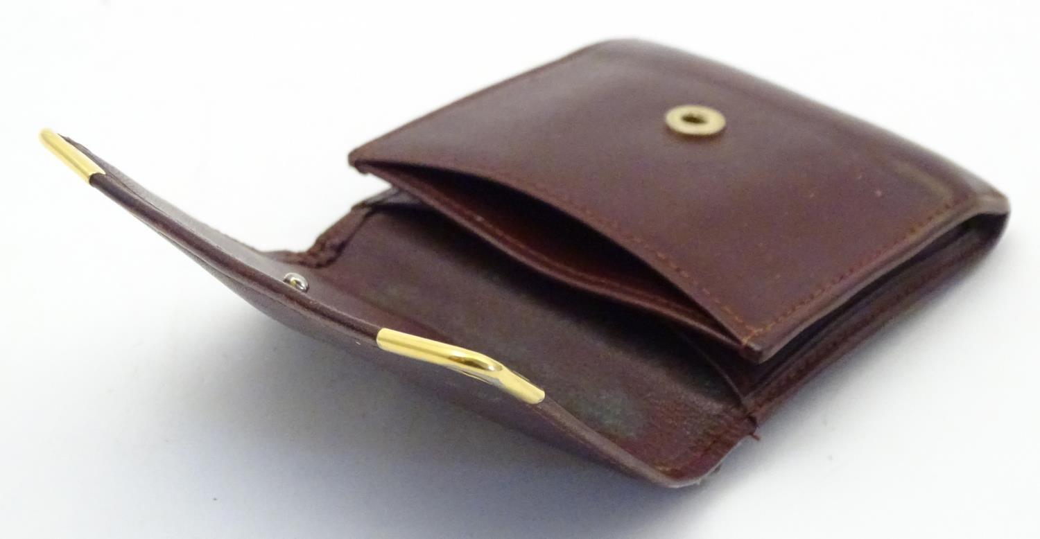 A Cartier small leather wallet / coin purse. Approx. 3 1/4" Please Note - we do not make reference - Image 4 of 6