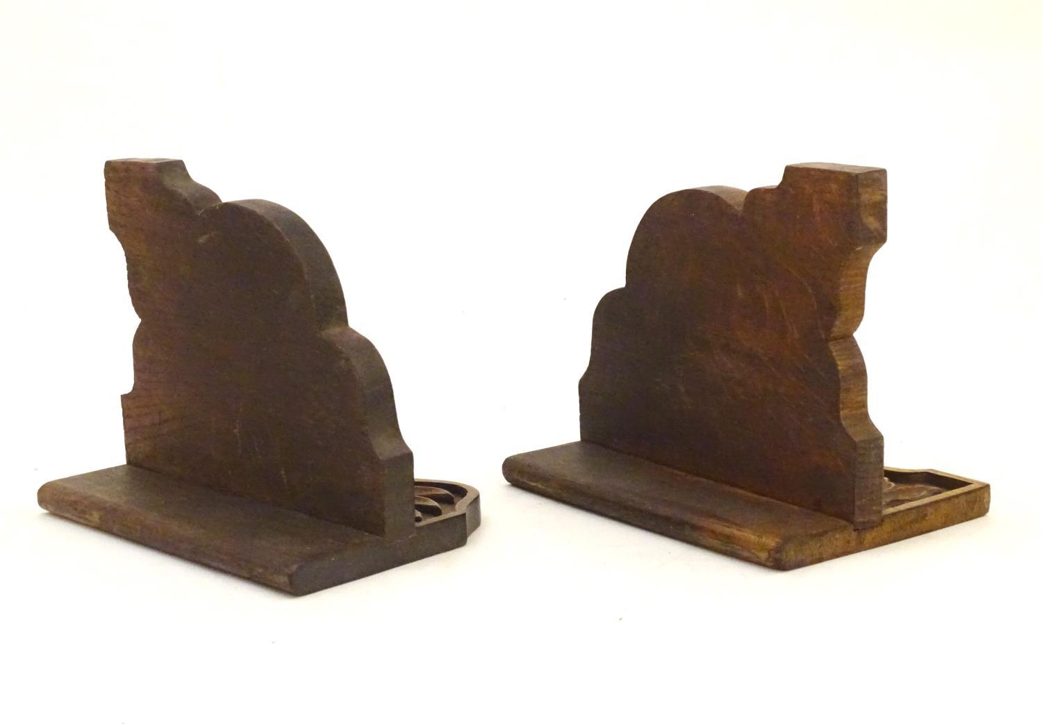 A pair of 20thC bookends with carved fish detail. Approx. 8" long (2) Please Note - we do not make - Image 6 of 7