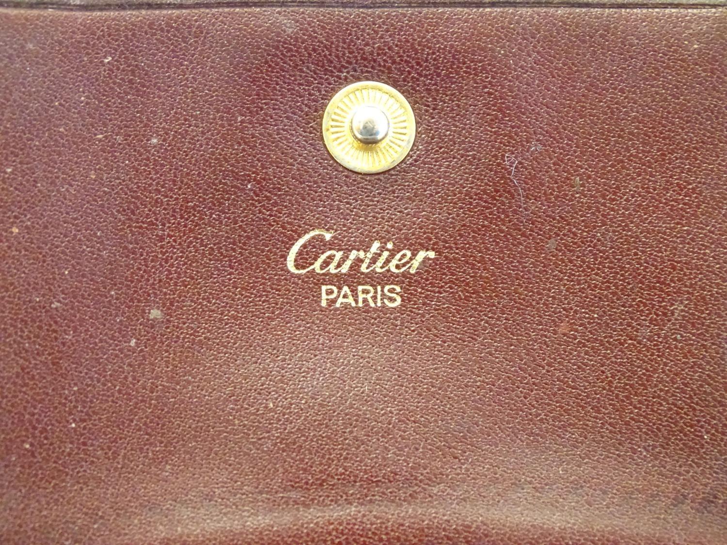 A Cartier small leather wallet / coin purse. Approx. 3 1/4" Please Note - we do not make reference - Image 5 of 6