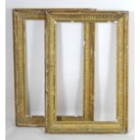A pair of gilt and gesso moulded picture frames. Approx. 39 1/4" x 23 1/2" (2) Please Note - we do