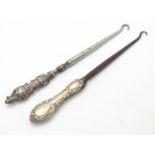 Two silver-handled lace / button hooks. Hallmarked Birmingham 1906 maker Adie & Lovekin Ltd and
