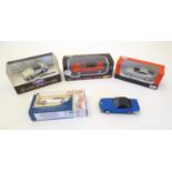 Toys: Four assorted boxed die cast scale models cars to include Corgi Classic Sports Cars MGA, Lledo