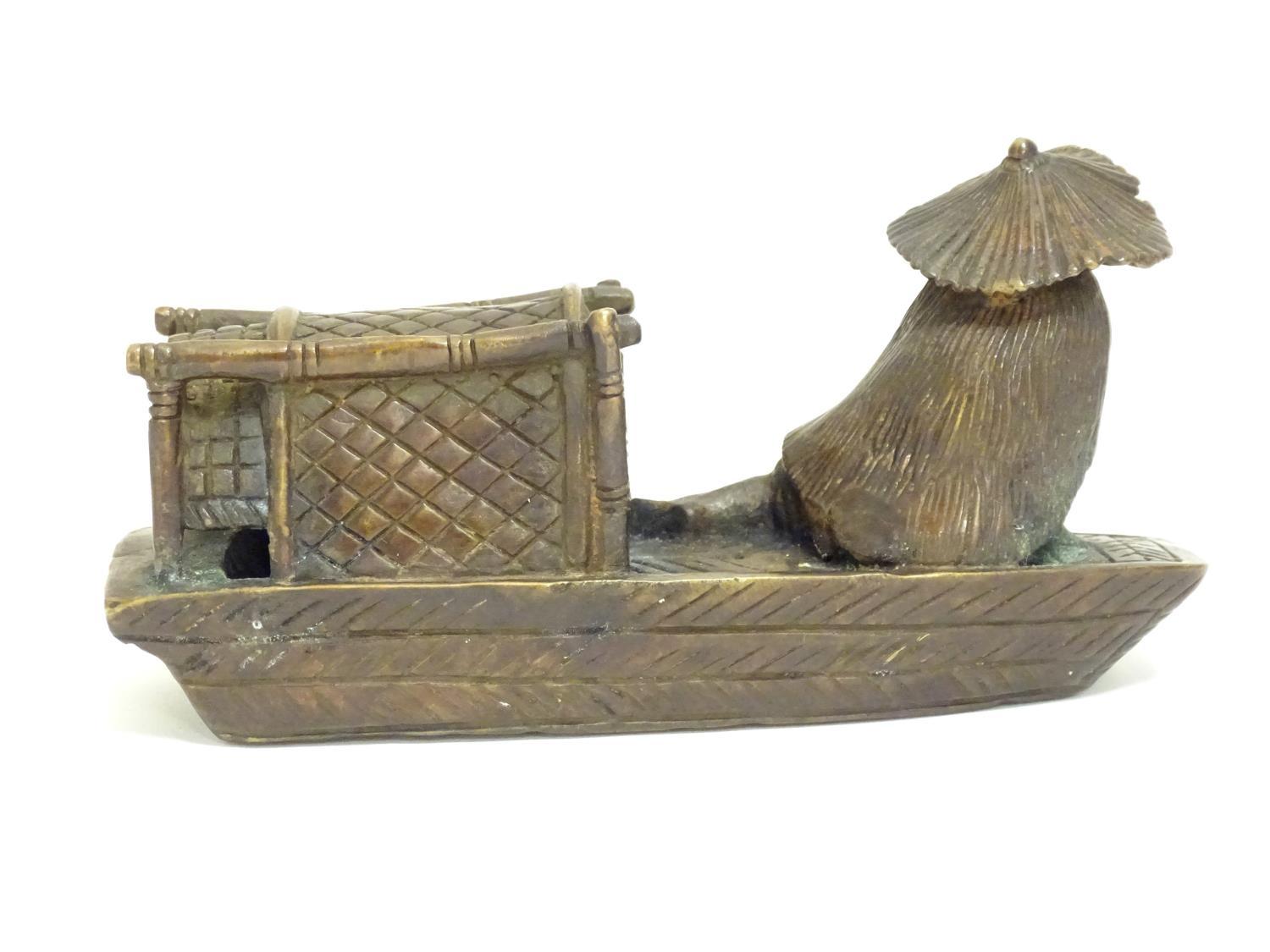 An Oriental bronze model of a fishing boat with a figure fishing. Approx. 6 1/2" long Please - Image 5 of 7