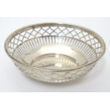 A silver bonbon dish with pierced decoration, hallmarked 1938, maker Mappin & Webb Ltd. Approx 4"