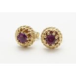 A pair of 9ct stud earring set with red spinel 1/4" Please Note - we do not make reference to the