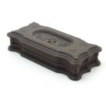 A late 19th / early 20thC Continental wooden stamp box with carved floral and foliate detail, with