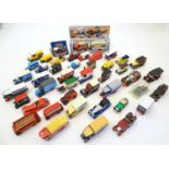 Toys: A large quantity of assorted die cast scale model cars / vehicles to include, advertising