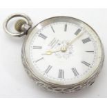 A silver cased Swiss pocket watch, the enamel dial marked H. E. Peck London. The dial approx. 1 1/4"
