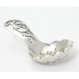 A silver caddy / sifter spoon with pierced bowl and fret work detail to handle. Hallmarked Sheffield