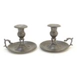 A pair of 19thC chamber sticks. Approx. 4" high (2) Please Note - we do not make reference to the