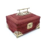 A 19thC fabric covered jewellery box with hinged lid and brass mounts. Approx. 5 1/4" x 9" x 6 3/