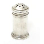 A small Art Deco pepper of cylindrical form with domed lid. Hallmarked Birmingham 1940 maker Adie