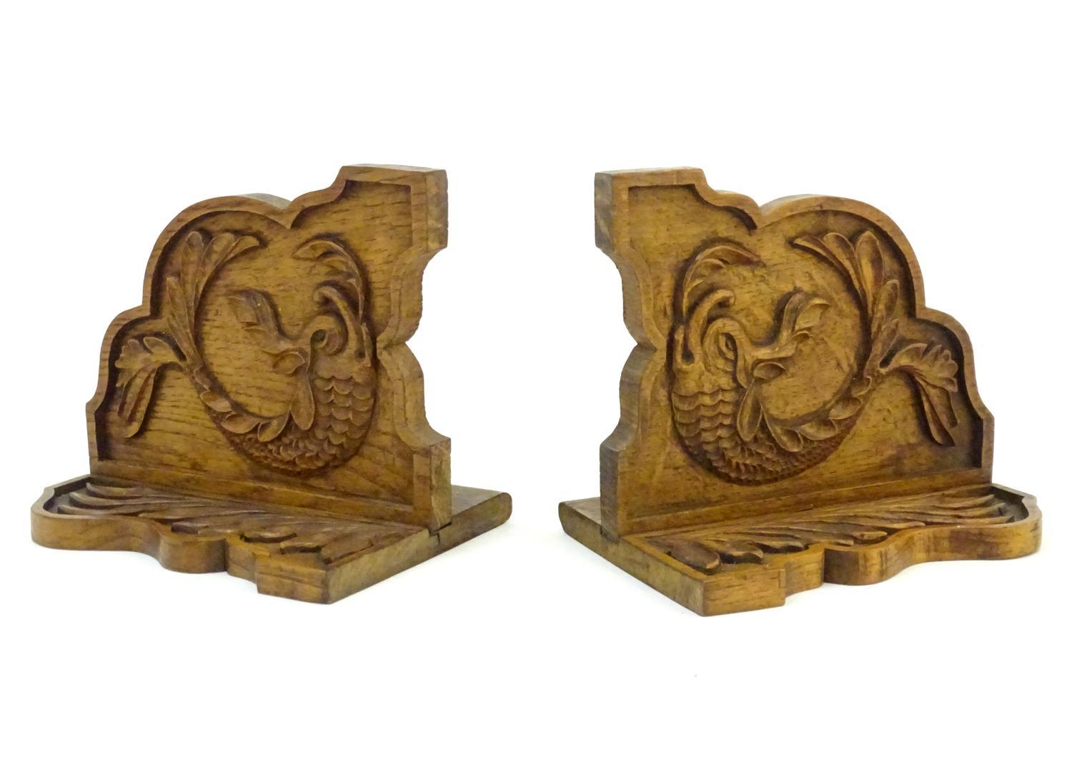 A pair of 20thC bookends with carved fish detail. Approx. 8" long (2) Please Note - we do not make - Image 5 of 7