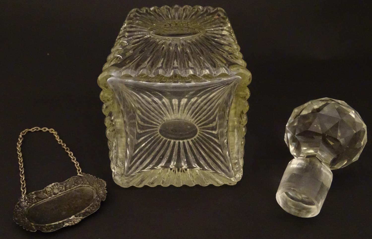 An early 20thC glass decanter of squared form. Together with a silver plate wine label / bottle - Image 7 of 7