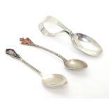 A child's silver spoon hallmarked Birmingham 1928 maker James Swann & Son together with 2 souvenir