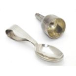 A child's silver spoon hallmarked Birmingham 1926 maker James Swann & Son. Together with a silver