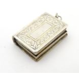 A Wm IV silver vinaigrette of book form. Hallmarked Birmingham 1836, maker Taylor & Perry approx
