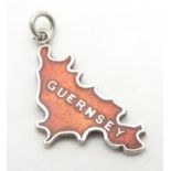 A silver pendant charm formed as the Channel Island Guernsey and decorated with guilloche enamel