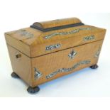 A 19thC satinwood tea caddy of sarcophagus form with mother of pearl foliate detail. The fitted
