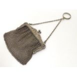 A silver mesh purse, probably French, with import marks for Paul Ettlinger, London. 1909. Approx.