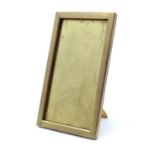 A late 19thC brass easel back photograph frame. Stamped MV. Approx. 8 1/4" high Please Note - we