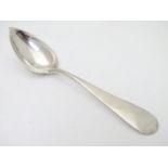 A mid 19thC Kingdom of Sardinia .800 Continental silver serving spoon with assay marks for Genoa