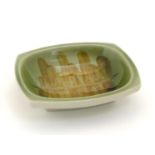 A Ditmar Urbach slipware bowl with hand painted green and brown abstract detail. Marked under and