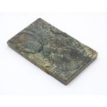 A Chinese hardstone inkstone depicting two birds. Approx. 2 1/4" x 3 1/2" Please Note - we do not
