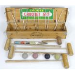 Toys: A John Jaques & Son Ltd croquet set, comprising 4 croquet mallets, 6 hoops, 1 peg, one small