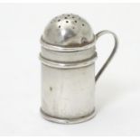 A Victorian silver small pepper formed as a flour shaker, hallmarked Birmingham 1897 maker Joseph
