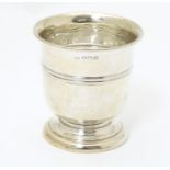 A silver beaker, hallmarked Birmingham 1928, maker Turner & Simpson 2 3/4" high Please Note - we