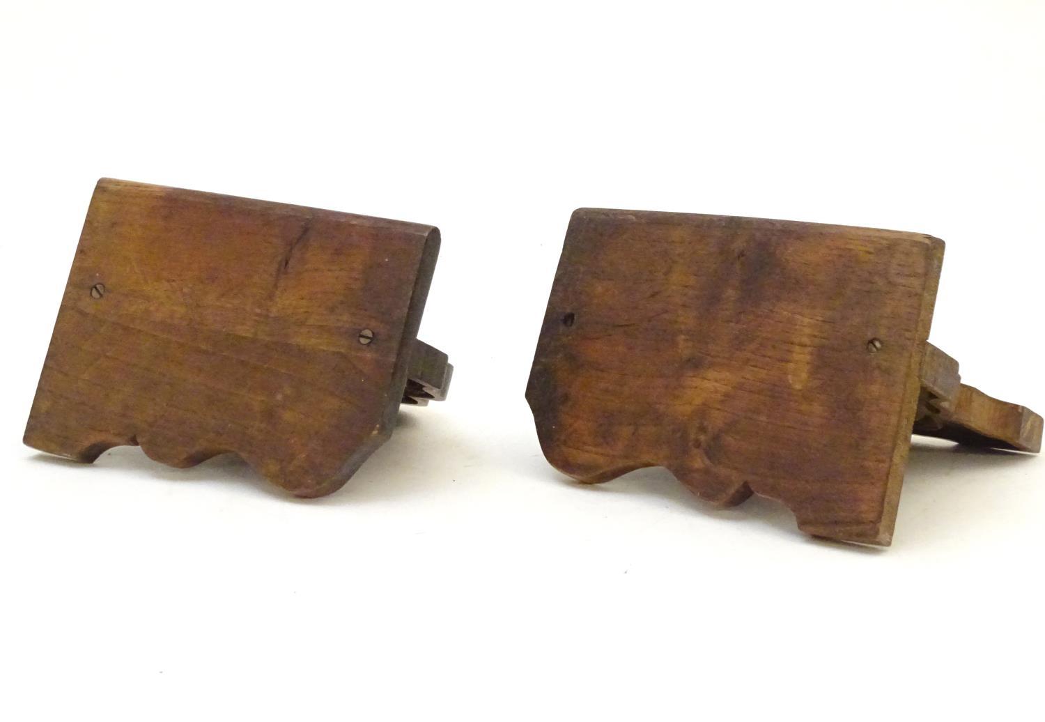 A pair of 20thC bookends with carved fish detail. Approx. 8" long (2) Please Note - we do not make - Image 7 of 7