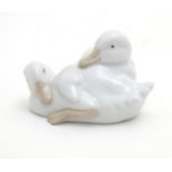 A Nao model of two sleeping ducks. Marked under. Approx. 2 1/4" high Please Note - we do not make