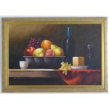 W. Hudson, XX, Oil on canvas, A still life study of fruit in a footed bowl, with a wine bottle,