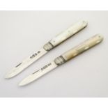 Two Victorian folding fruit knives with mother of pearl handles and silver blades hallmarked