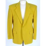 Vintage clothing/ fashion: A yellow wool and cashmere men's jacket by Yves Saint Laurent. Chest size