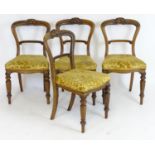 A set of four 19thC rosewood balloon back chairs with carved cresting rails, moulded frames and