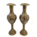 A pair of large Indian brass vases of baluster form with engraved and enamelled decoration depicting