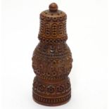 Kitchenalia : A treen shaker / pepperette with carved decoration unscrewing to top and bottom 4 1/