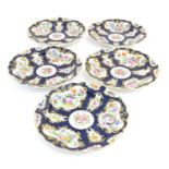 Five 19thC Royal Worcester dessert plates with scalloped rims decorated with hand painted with