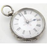 A .800 silver cased Continental pocket watch with enamel dial. Dial approx. 1 1/4" diameter Please