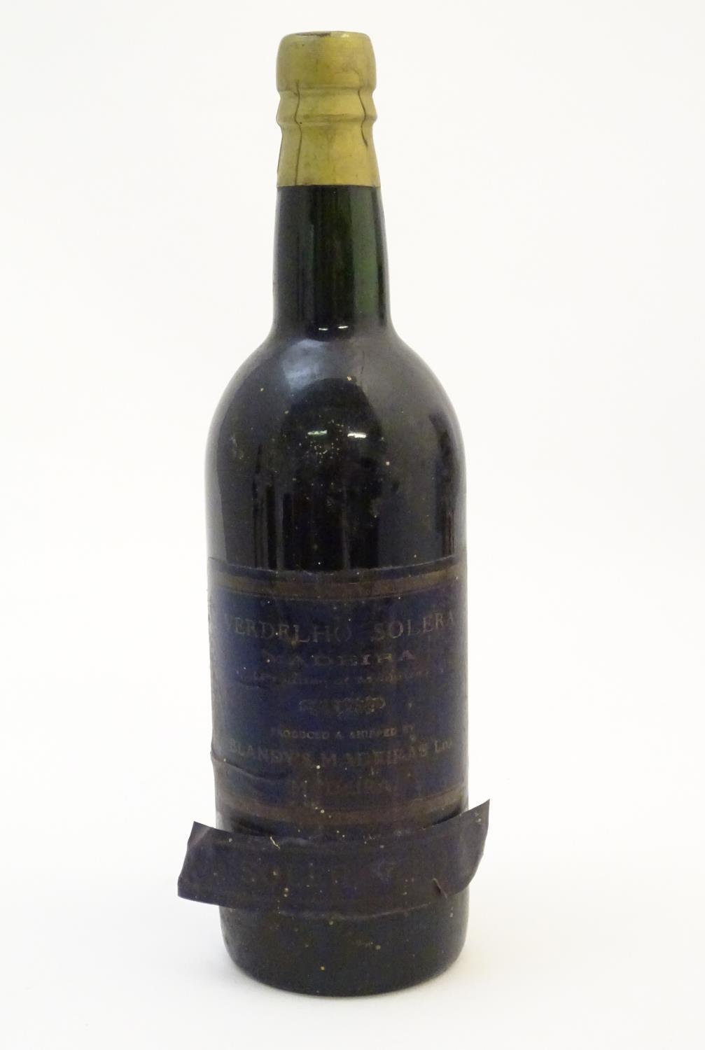 A bottle of 1880 Blandy's Verdelho Solera madeira, 70cl Please Note - we do not make reference to