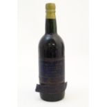 A bottle of 1880 Blandy's Verdelho Solera madeira, 70cl Please Note - we do not make reference to
