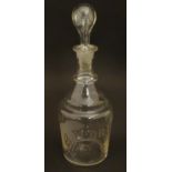 A 19thC glass Port decanter with etched fruiting vine decoration and titled 'Port'. 10 1/4" high