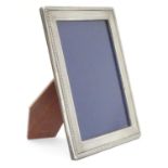A photograph frame with silver surround. Approx 6" x 4 1/22 overall. Please Note - we do not make