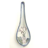 A Chinese rice / soup spoon with hand painted decoration depicting a figure in a landscape with
